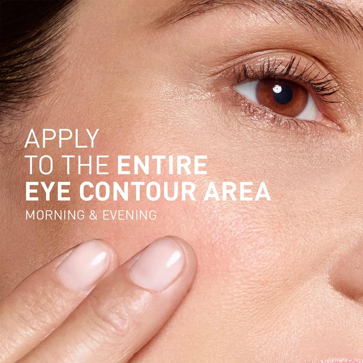 Close-up of a person's eye with text overlay on skincare application.