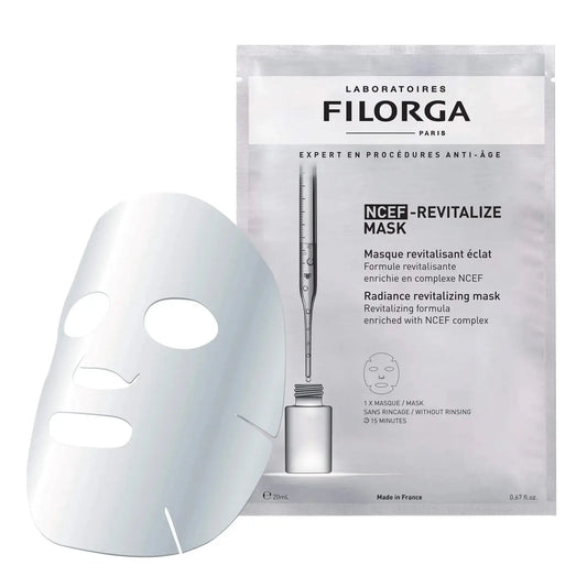 A white FILORGA NCE-REVITALIZE MASK sheet shown in front of its silver and white packaging pouch on a plain white background.