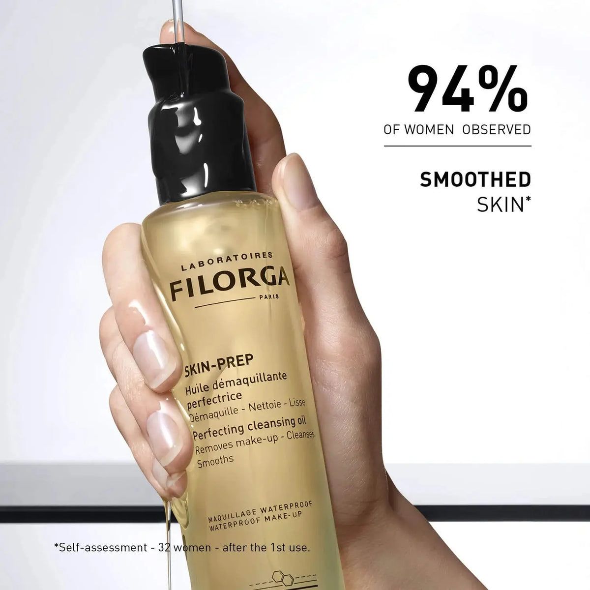 Hand holding a Filorga skincare product with text about skin smoothing.