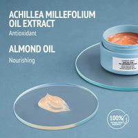 Load image into Gallery viewer, Cosmetic jar with almond oil extract on a blue background
