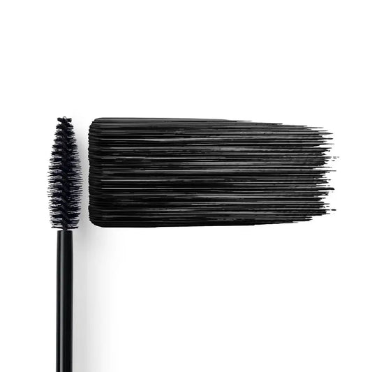 Close-up of a mascara wand with black bristles on a white background