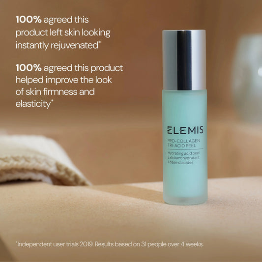 Elemis Pro-Collagen Tri-Acid Peel hydrating acid peel in a frosted light green bottle with a silver cap, set on a beige surface with text overlays and a soft-focus background.