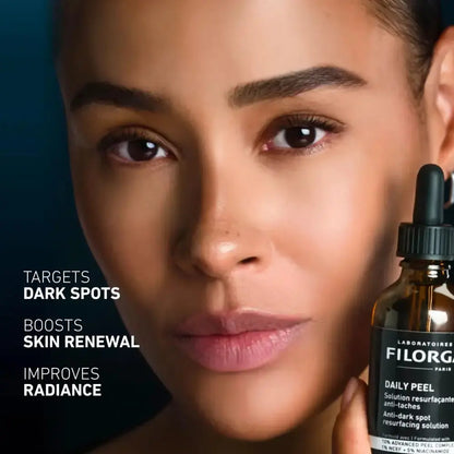 Woman holding a bottle of Filorga skincare product with text highlighting product benefits.