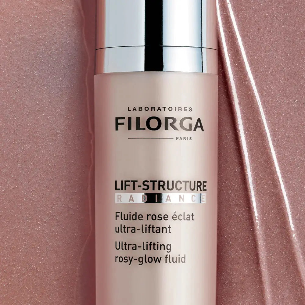 Filorga Lift-Structure Radiance skincare product on a pink background
