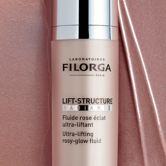 Filorga Lift-Structure Radiance skincare product on a pink background