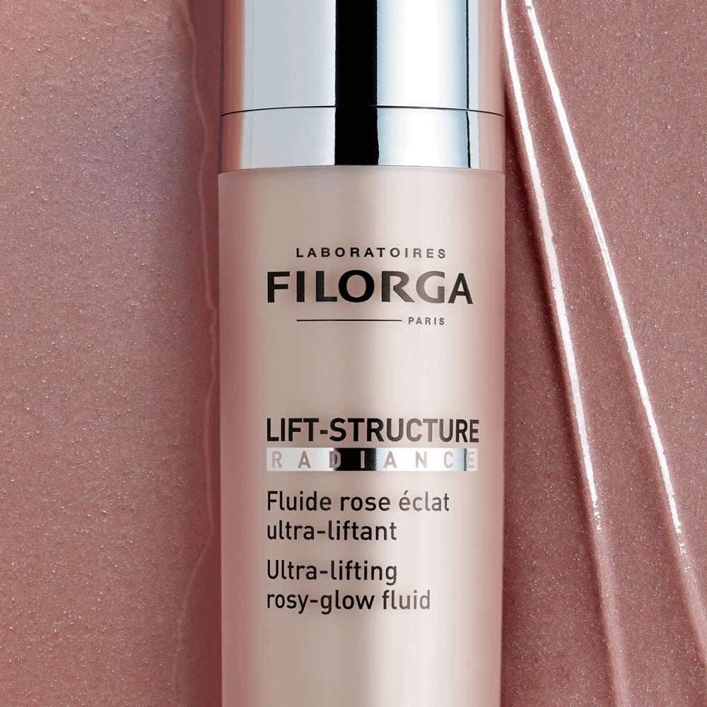 Filorga Lift-Structure Radiance skincare product on a pink background