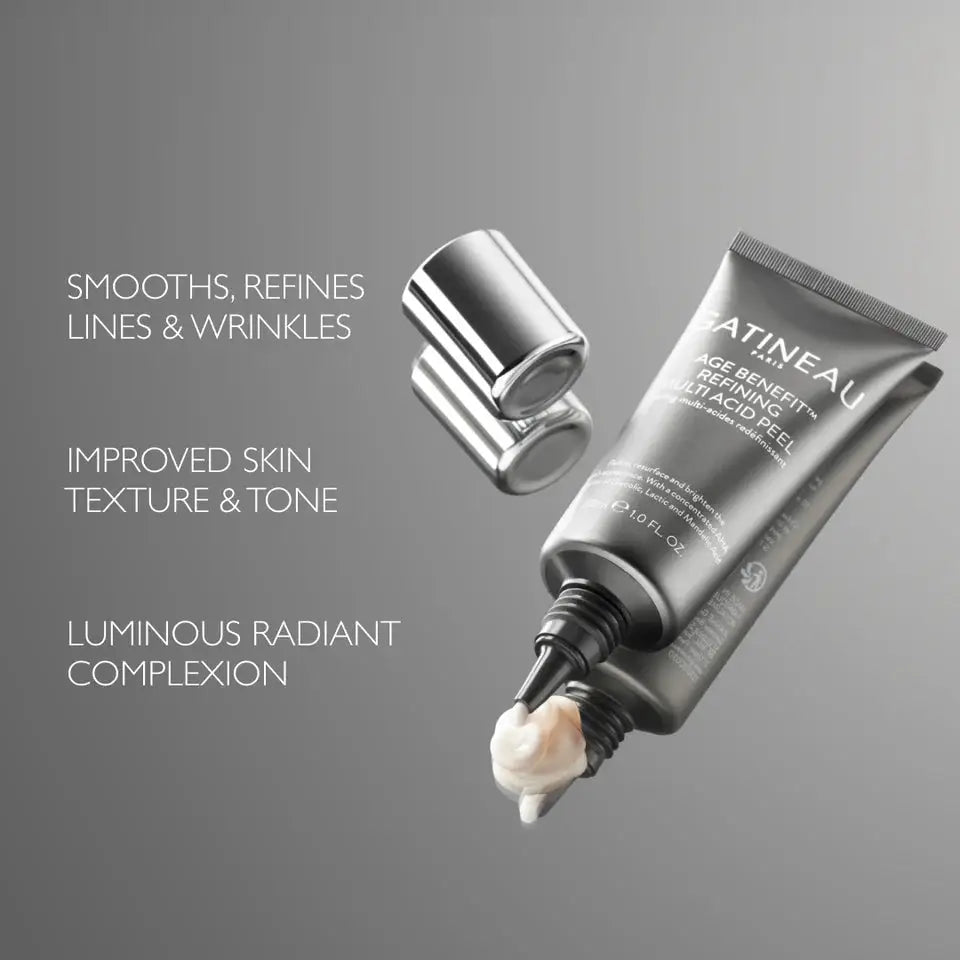 Cosmetic tube with cream being squeezed out on a gray background