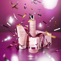 Load image into Gallery viewer, Gatineau skincare products with confetti on a purple background
