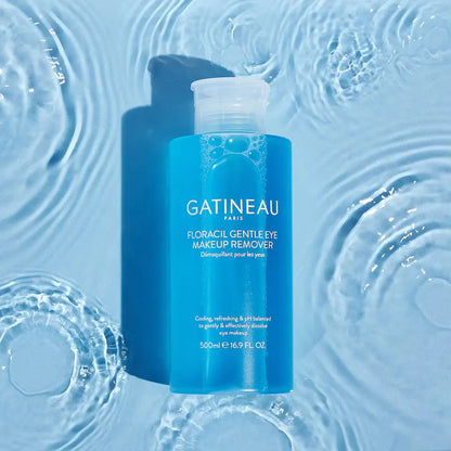 Blue bottle of Gatineau eye makeup remover on a blue water background