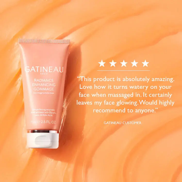 A squeeze tube of Gatineau Paris Radiance Enhancing Gommade on a peach-orange textured background, with a customer quote and five stars printed to the right.