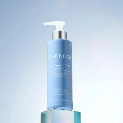Blue skincare bottle with pump labeled 'Gatineau' on a light blue background