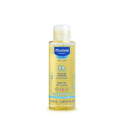Mustela Baby Oil with avocado oil in a 100ml clear plastic bottle with a white cap, shown on a plain white background.