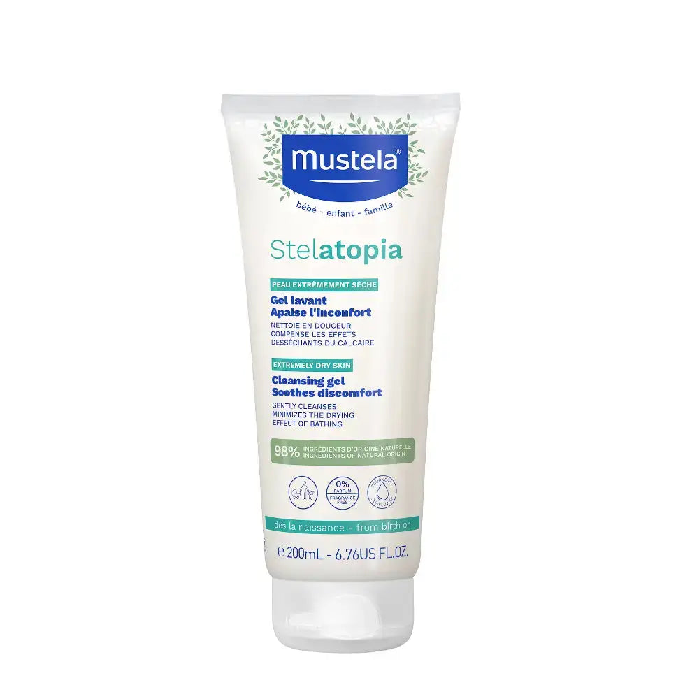 Mustela Stelatopia intensely dry skin cleansing gel in a 200 mL white squeeze tube with blue and green text and graphics, shown on a plain white background.