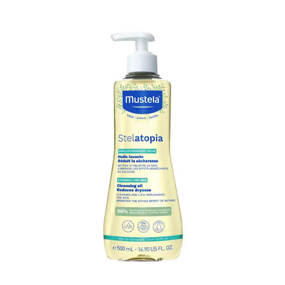 A 500 mL bottle of Mustela Stelatopia gentle cleansing all with a white pump dispenser, shown against a plain white background.