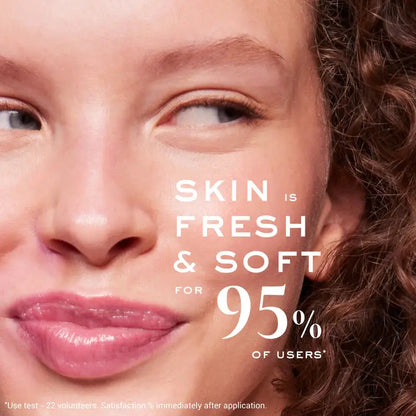 Close-up of a woman's face with text about skin freshness and softness.