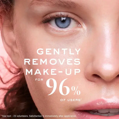 Close-up of a person's eye with text claiming product effectiveness on makeup removal.