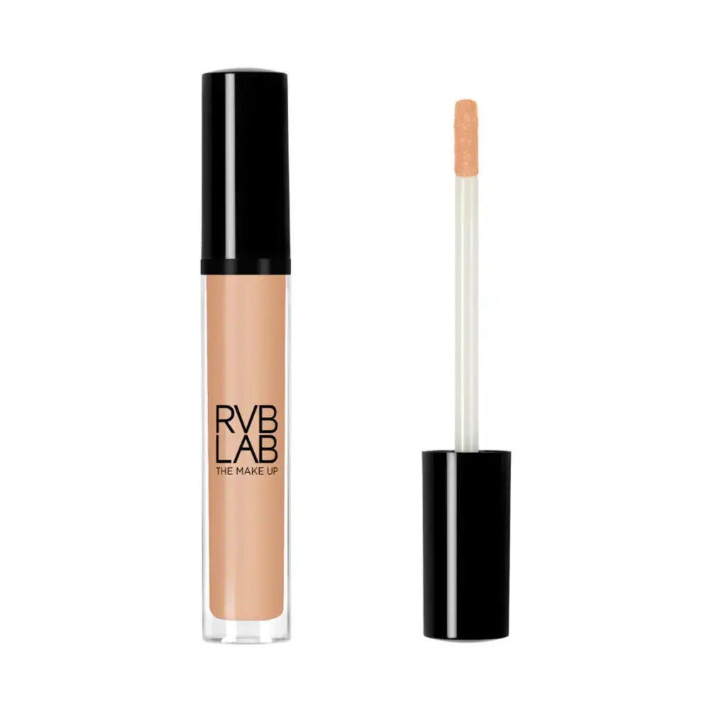 A bottle of RYB LAB liquid concealer with a black cap next to its applicator wand, showing a light beige-peach makeup shade on a clean white background.