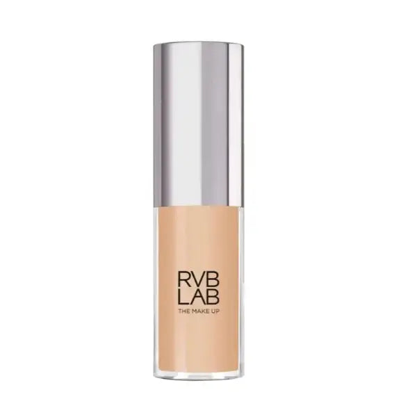 Foundation bottle with silver cap and beige body on a white background