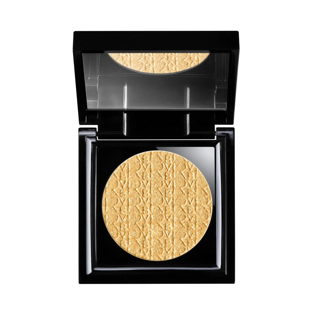 Compact powder in a black case with visible branding on a white background