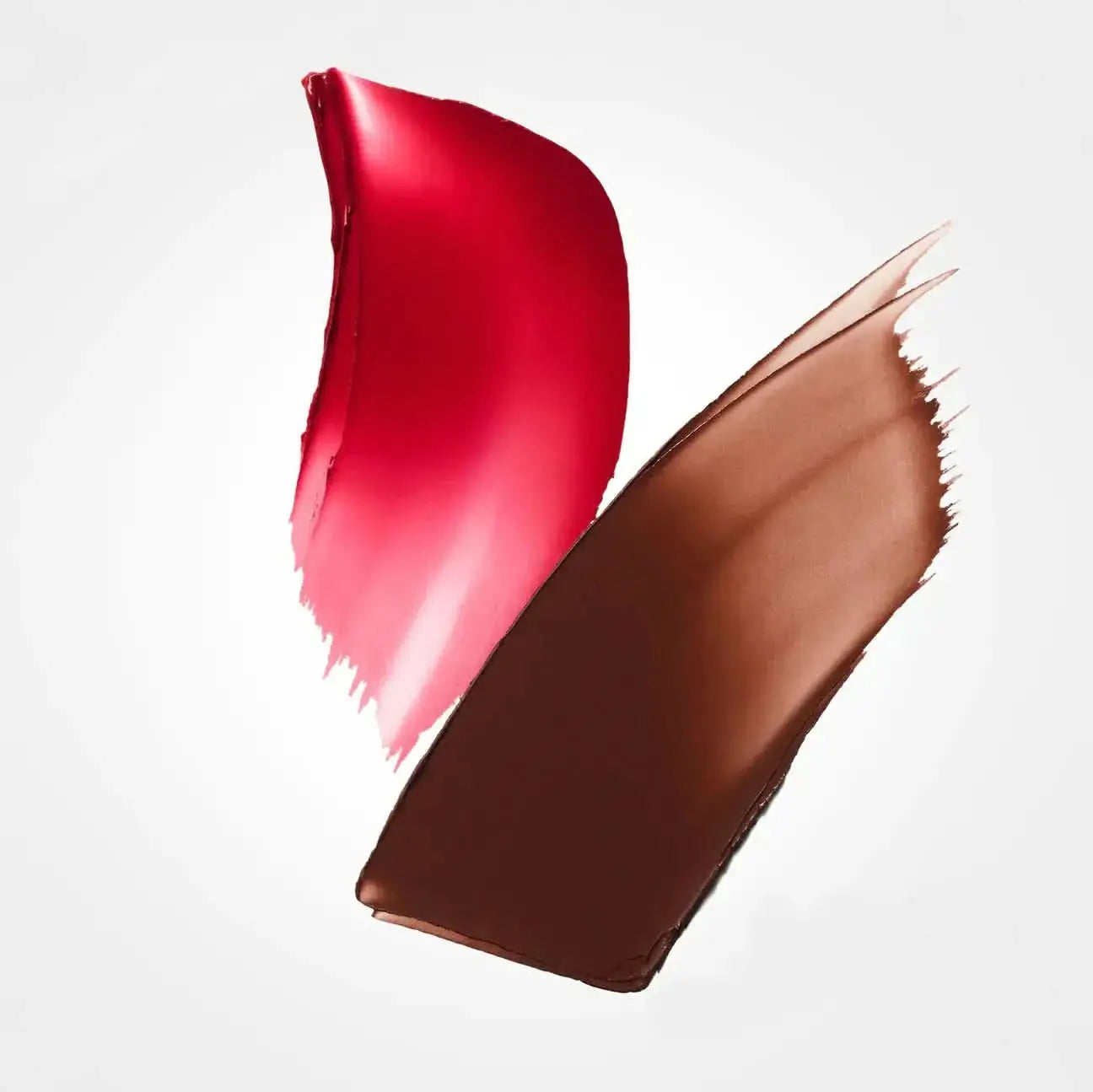 Two swatches of red and brown lipstick on a white background