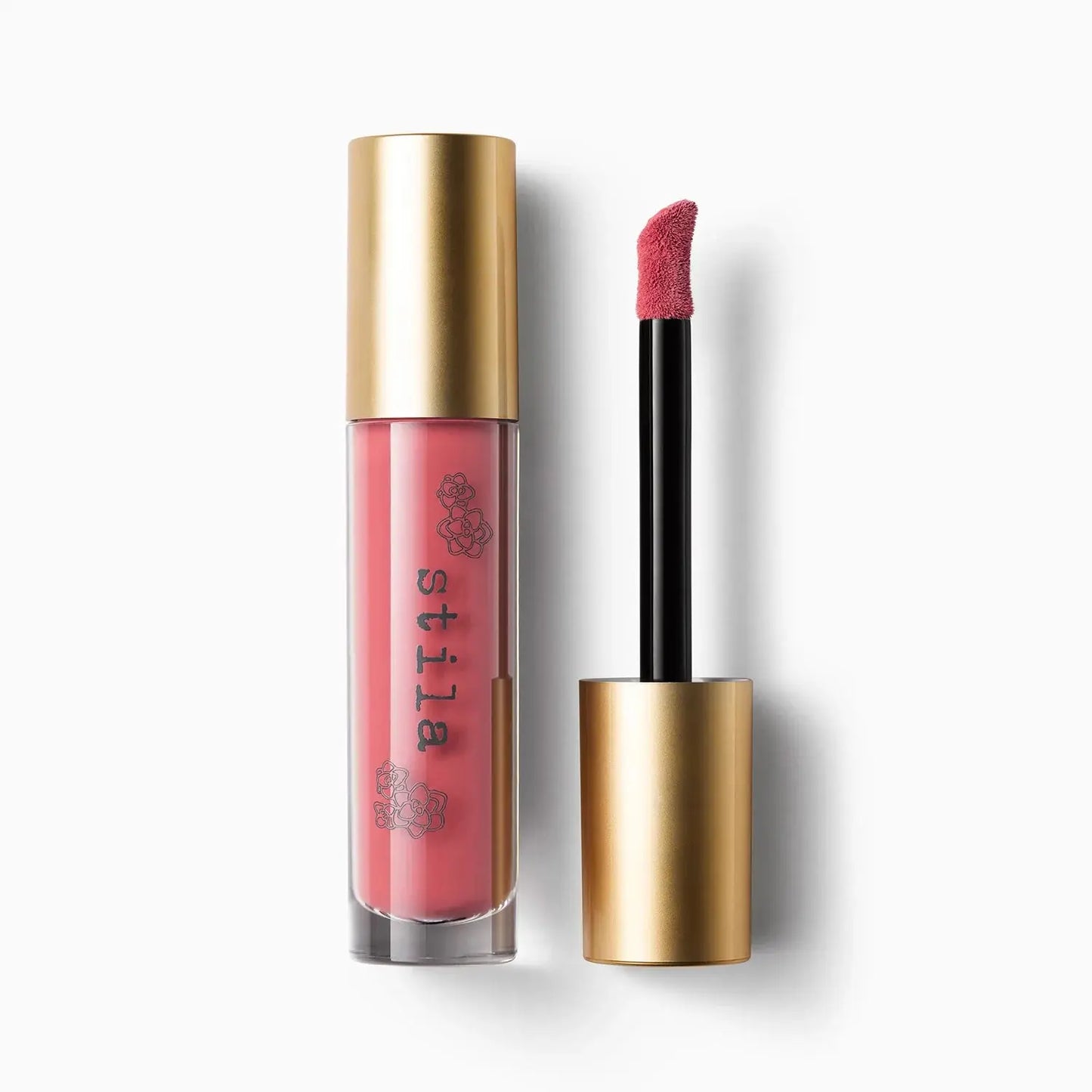 Pink lip gloss with gold cap and applicator on a white background