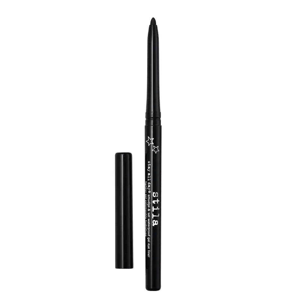A black dual-ended cosmetic pencil with white text and star graphics, shown alongside its matching black cap on a plain white background.