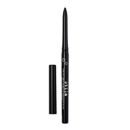 A black dual-ended cosmetic pencil with white text and star graphics, shown alongside its matching black cap on a plain white background.