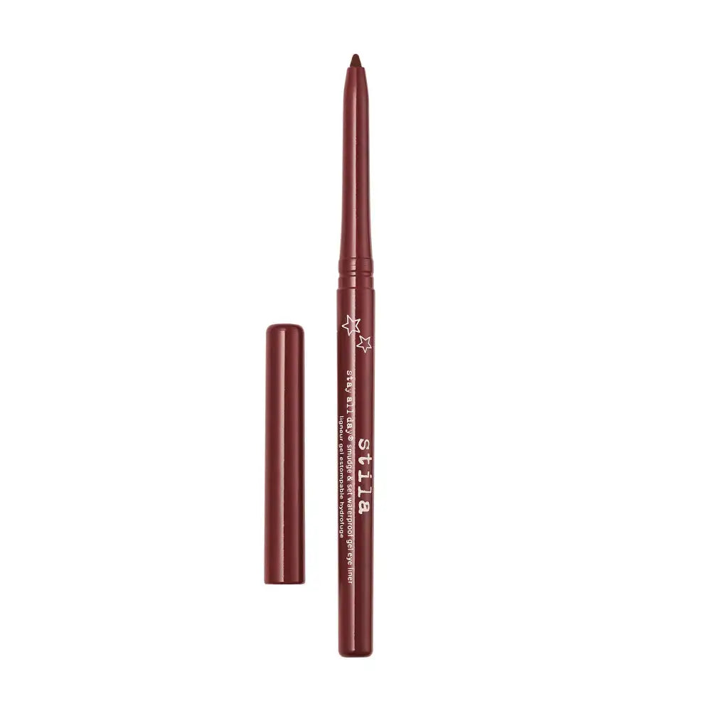 A dark reddish-brown lip liner pencil with its cap removed, displayed vertically next to it on a plain white background. The brand name 'sittas' is printed vertically on the barrel.