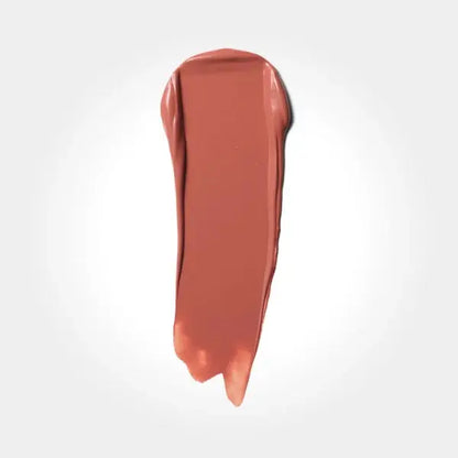 Nude-colored lipstick swatch on a light gray background