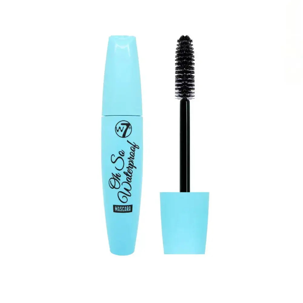 Mascara with blue casing and black brush on a white background