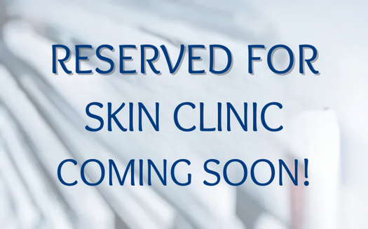 Placeholder graphic with the text 'RESERVED FOR SKIN CLINIC COMING SOON!' in large blue letters over a softly blurred light background.